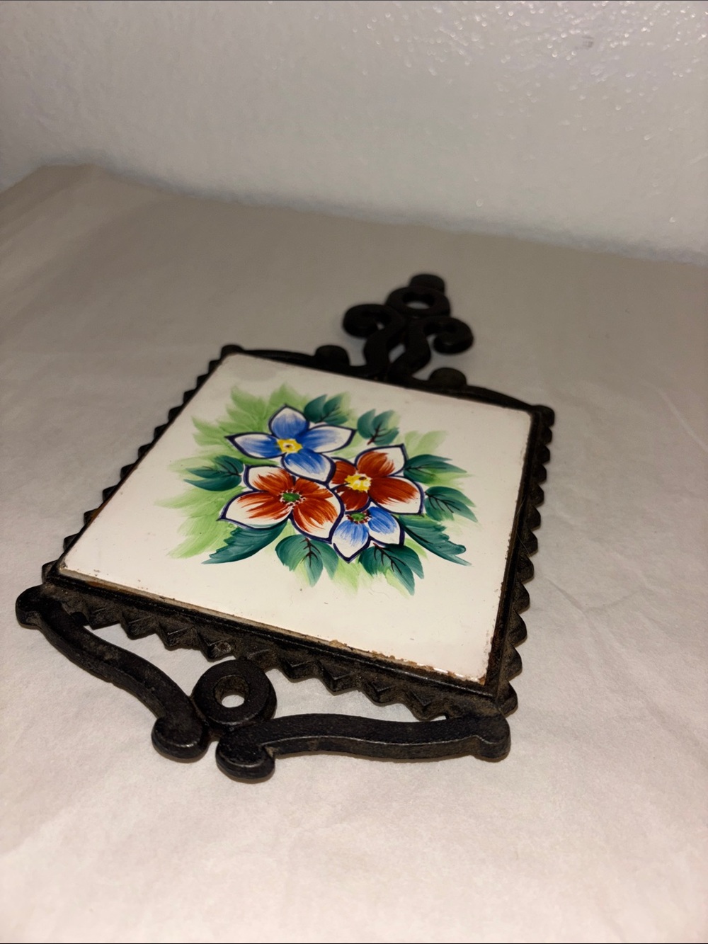 Vintage Japanese Hand-Painted Floral Ceramic and Cast Iron Trivet